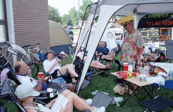 Customers of Bubba's
            Pampered Pedalers take it easy in Ashwaubenon after 55 miles
            of cycling. 